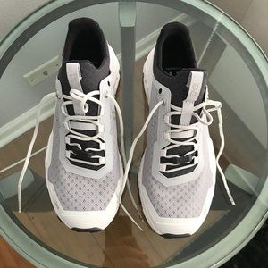 On Running White and Black Athletic Shoes Sleek Design
